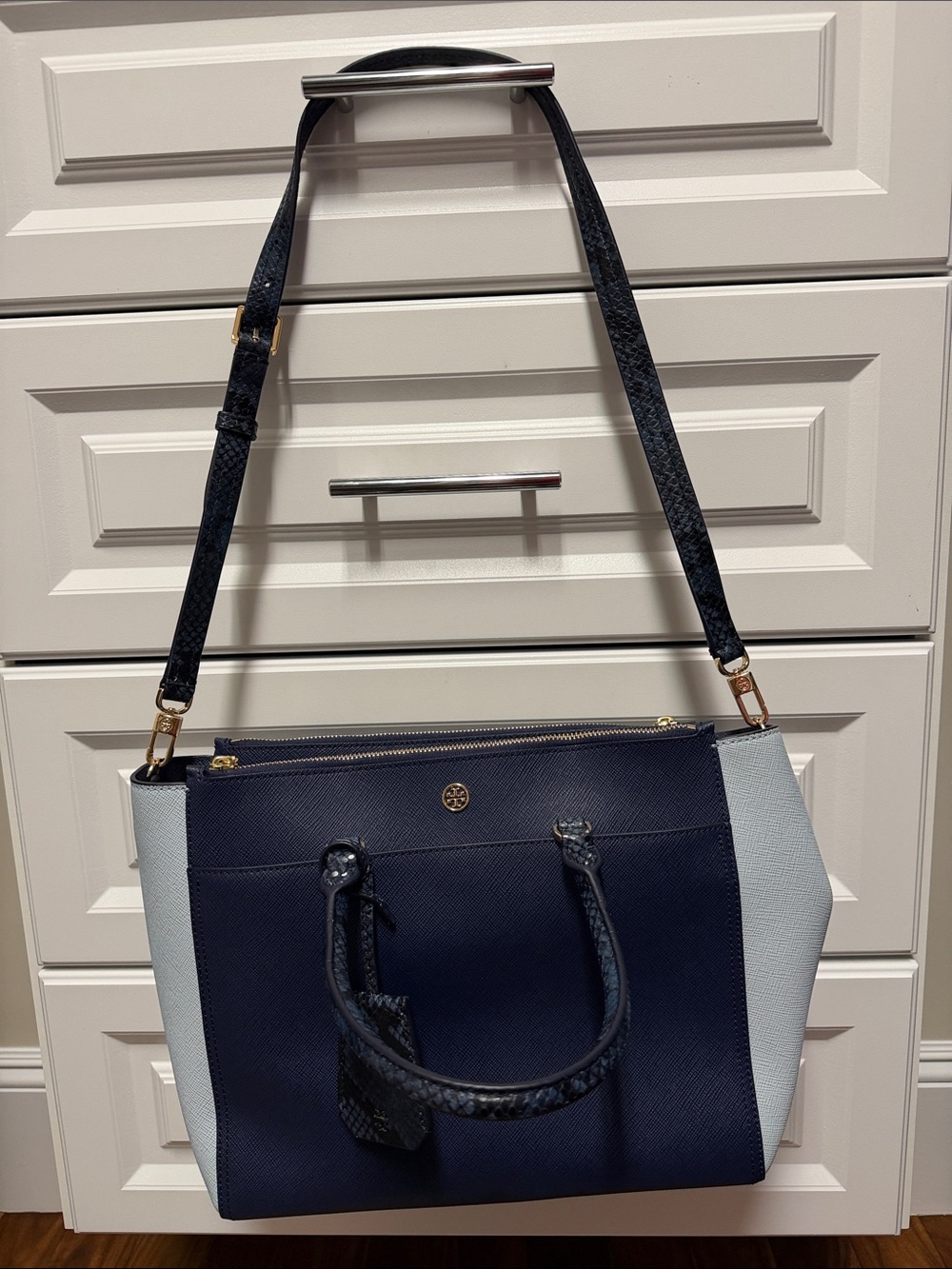 Tory Burch Navy Tote with Light Blue Side Panels.  Never worn.  Several pockets.